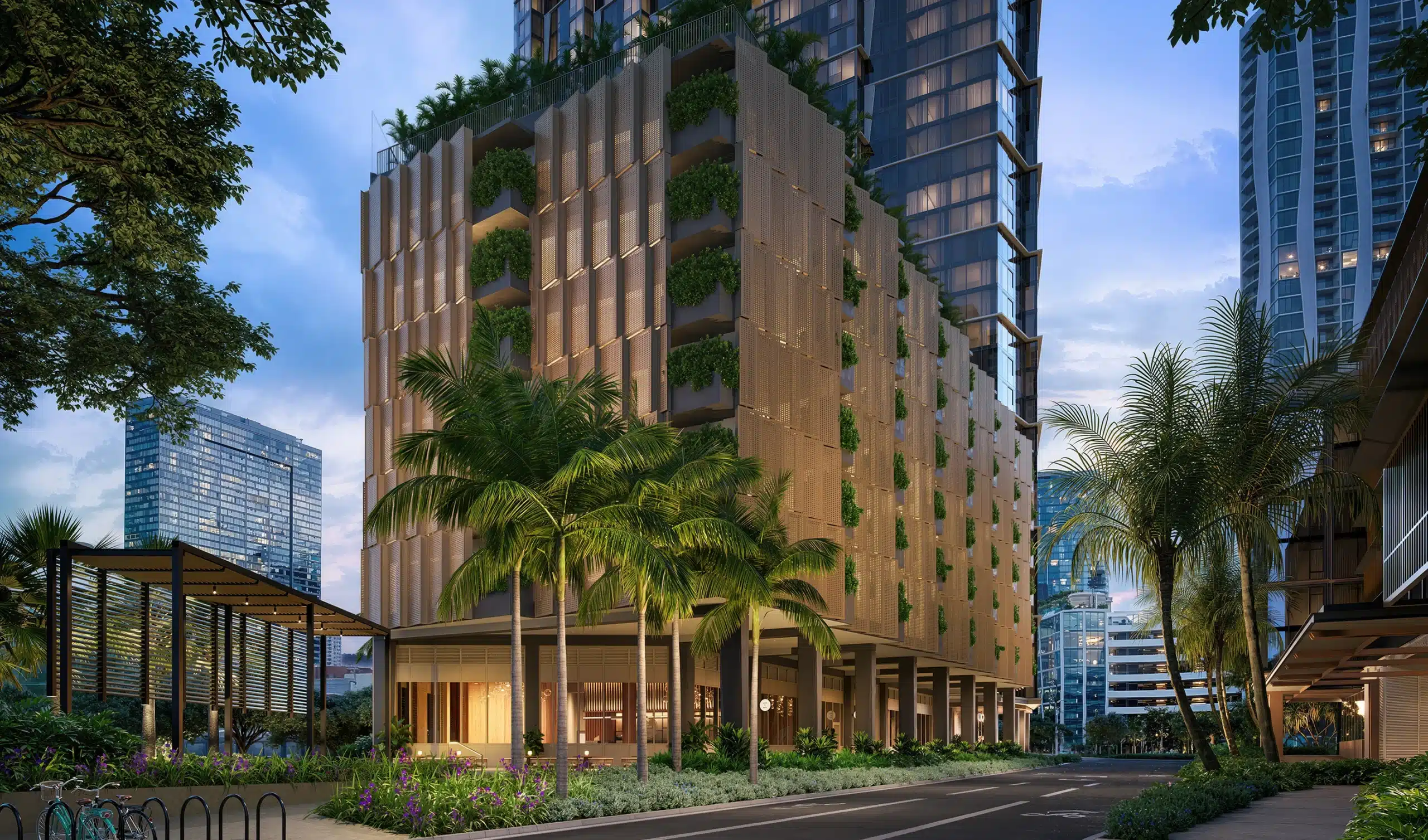 Modern city building with greenery on balconies, palm trees in front, and high-rise towers in the background under a blue sky.