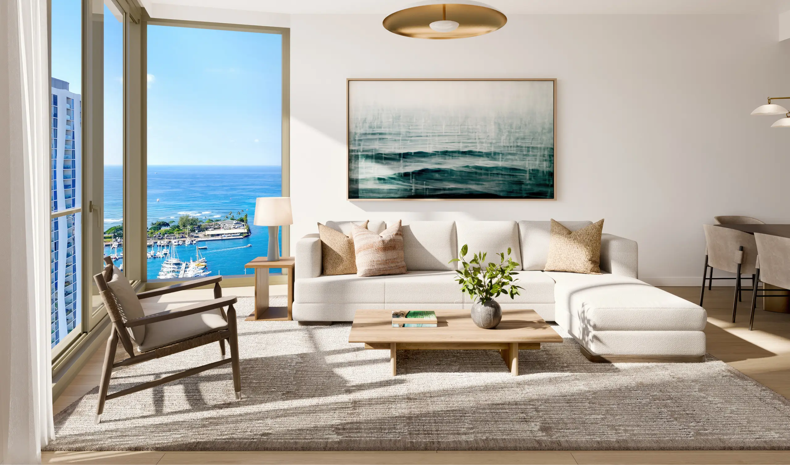 Modern living room with white sectional sofa, armchair, and wooden coffee table. Large window shows a marina and ocean view. Framed abstract art hangs on the wall above the sofa.